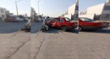 Accidente entre taxi y moto 