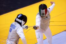 Esgrima con medalla de oro