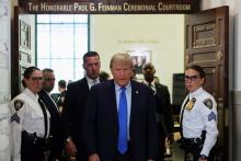 Sus hijos Donald Jr. y Eric, acusados también en el juicio civil por fraude inmobiliario.